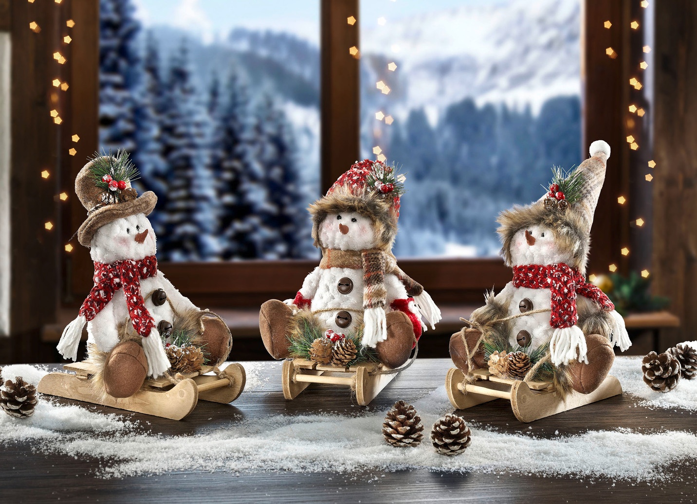 Schneemänner, 3er-Set, auf Schlitten aus Holz