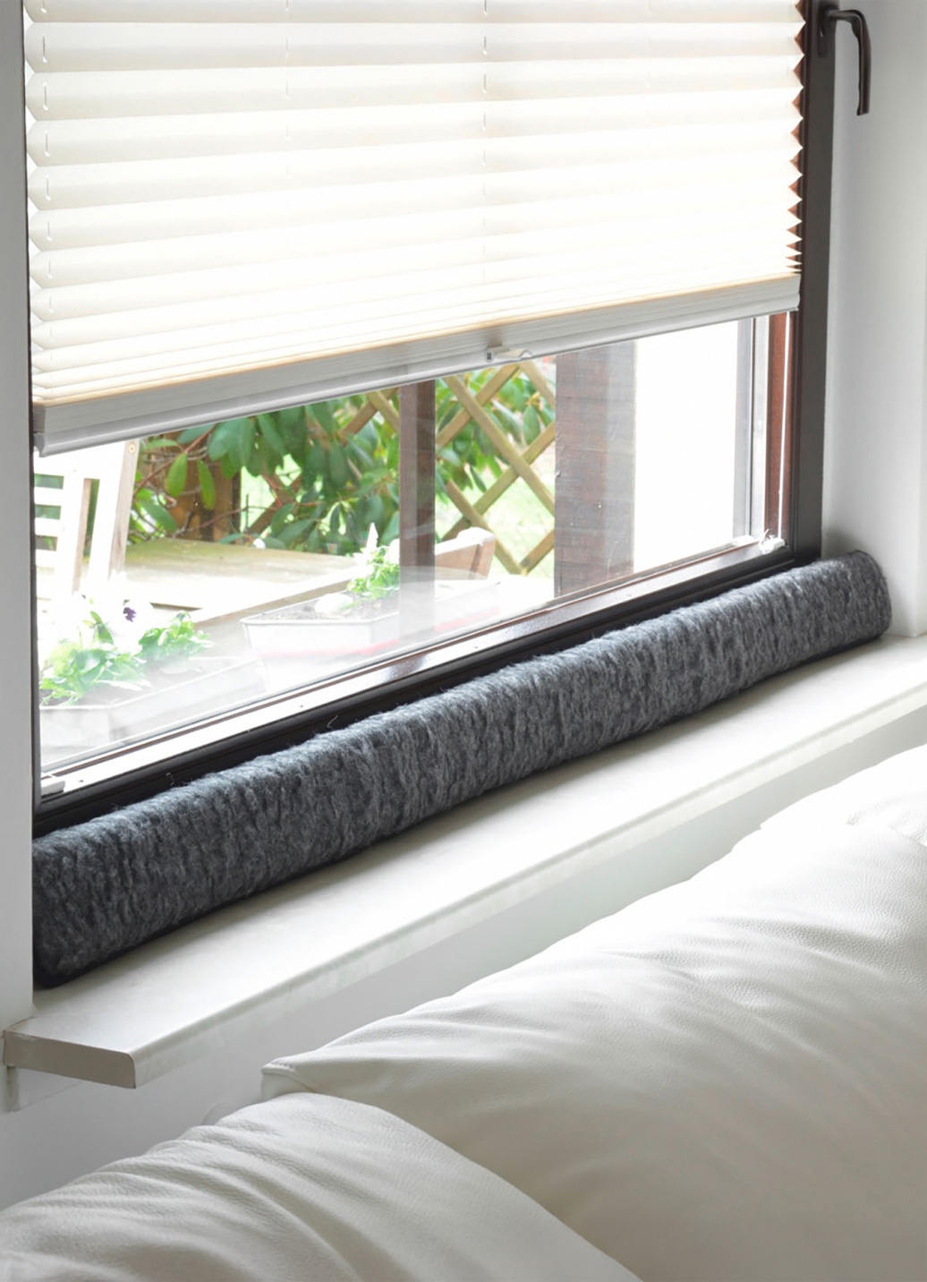 Schurwoll-Zugluftstopper für Fenster
