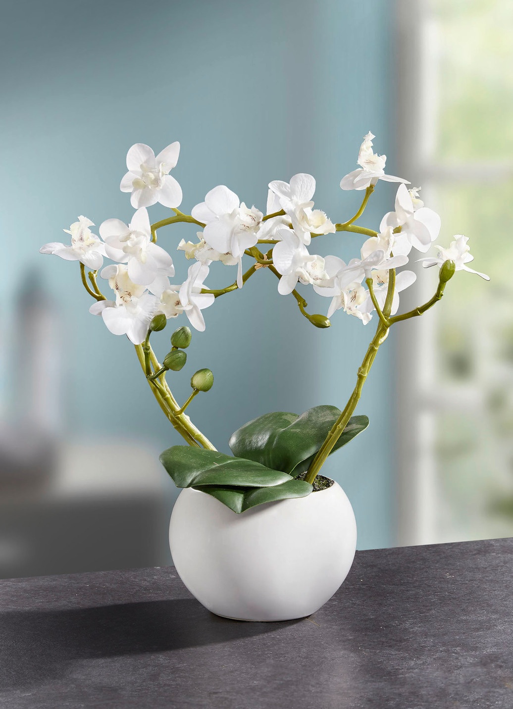 Orchideen-Gesteck im Keramiktopf